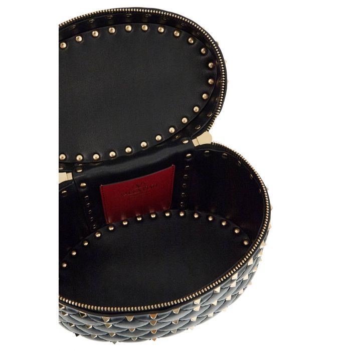 chain black quilted leather cylindrical vanity bag